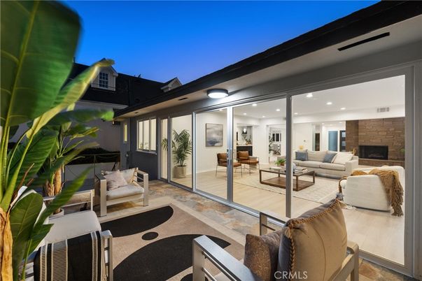 Exterior, Fireplace, Living room, Recessed Lighting, Stone Walls