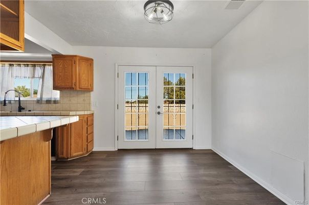 Interior, Kitchen, Tile Countertops, Wood Texture Flooring