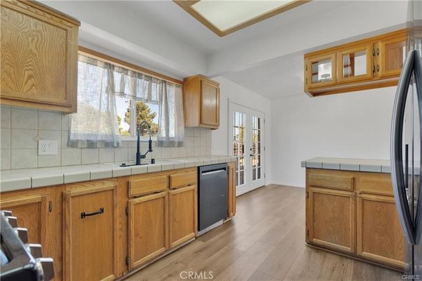 Interior, Kitchen, Tile Countertops, Wood Texture Flooring