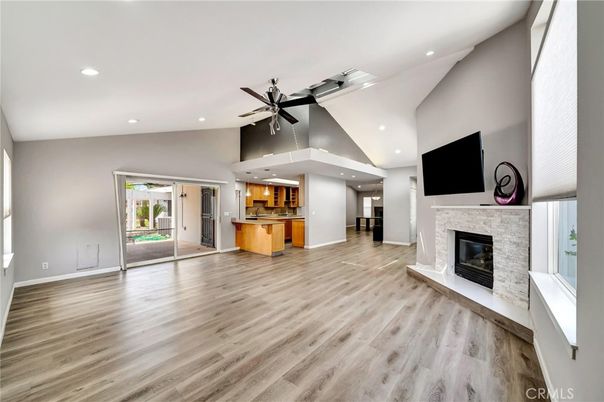 Empty room, Fireplace, Interior, Kitchen, Recessed Lighting, Wood Texture Flooring