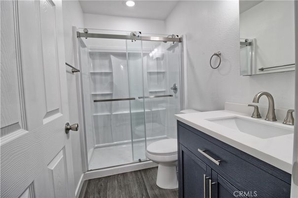 Bathroom, Glass Shower, Interior, Recessed Lighting, Wood Texture Flooring