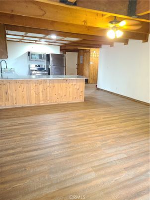 Empty room, Interior, Kitchen, Stainless Steel Appliances, Wooden Beams, Wood Texture Flooring