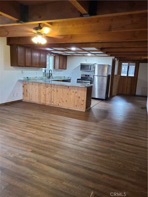 Empty room, Interior, Kitchen, Stainless Steel Appliances, Wooden Beams, Wood Texture Flooring