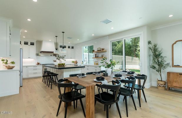 Dining room, Interior, Kitchen, Pendant Lights, Recessed Lighting, Stainless Steel Appliances, Stone Walls, Wood Texture Flooring