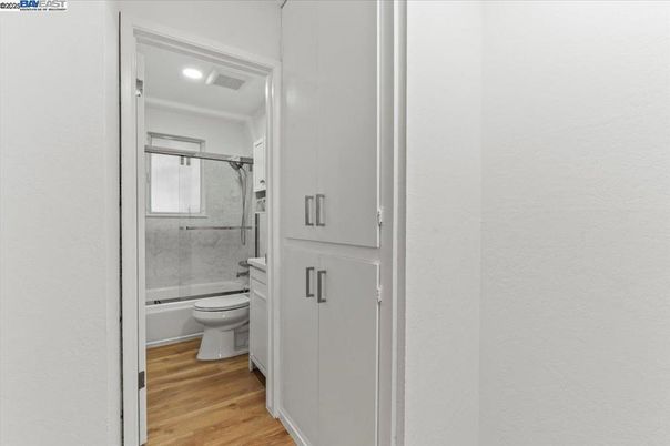 Bathroom, Glass Shower, Interior, Recessed Lighting, Wood Texture Flooring