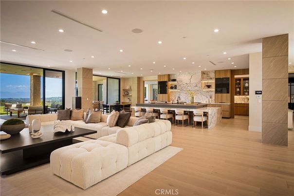 Dining room, Interior, Kitchen, Living room, Marble Walls, Recessed Lighting, Stainless Steel Appliances, Wood Texture Flooring