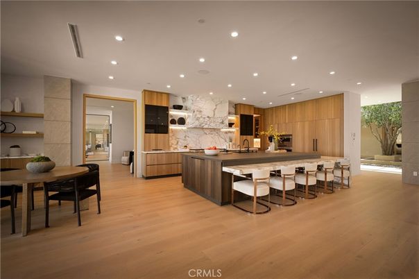 Dining room, Interior, Kitchen, Marble Walls, Recessed Lighting, Stainless Steel Appliances, Wood Texture Flooring