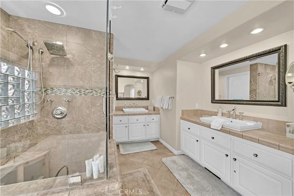 Bathroom, Dual Sink Vanities, Glass Shower, Interior, Recessed Lighting, Tile Countertops