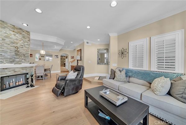 Dining room, Fireplace, Interior, Living room, Pendant Lights, Recessed Lighting, Stone Walls, Wood Texture Flooring