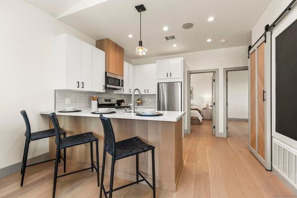 Interior, Kitchen, Pendant Lights, Recessed Lighting, Stainless Steel Appliances, Wood Texture Flooring