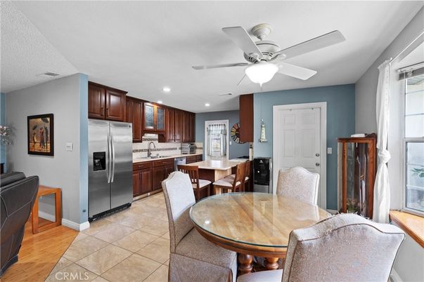 Dining room, Interior, Kitchen, Recessed Lighting, Stainless Steel Appliances, Wood Texture Flooring