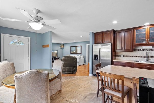 Dining room, Interior, Kitchen, Living room, Recessed Lighting, Stainless Steel Appliances, Wood Texture Flooring