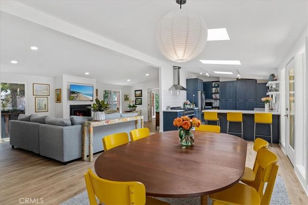 Dining room, Fireplace, Interior, Kitchen, Living room, Pendant Lights, Recessed Lighting, Stainless Steel Appliances, Wood Texture Flooring