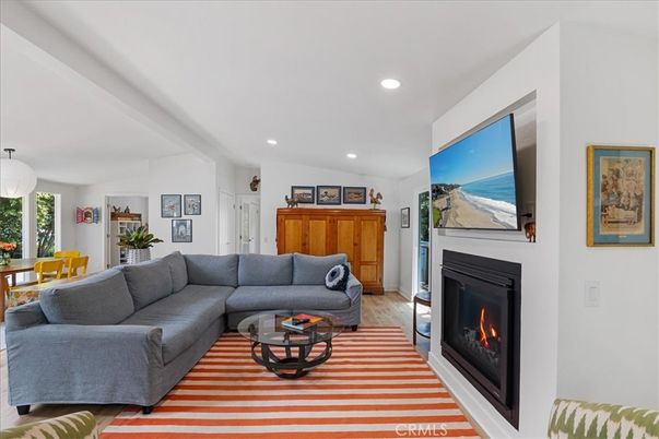 Dining room, Fireplace, Interior, Living room, Recessed Lighting, Wood Texture Flooring