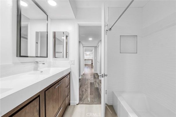 Bathroom, Dual Sink Vanities, Interior, Recessed Lighting, Wood Texture Flooring