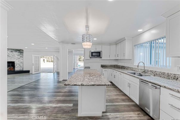 Fireplace, Interior, Kitchen, Pendant Lights, Recessed Lighting, Stone Walls, Wood Texture Flooring