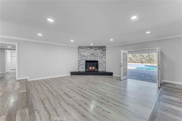 Empty room, Fireplace, Interior, Recessed Lighting, Wood Texture Flooring