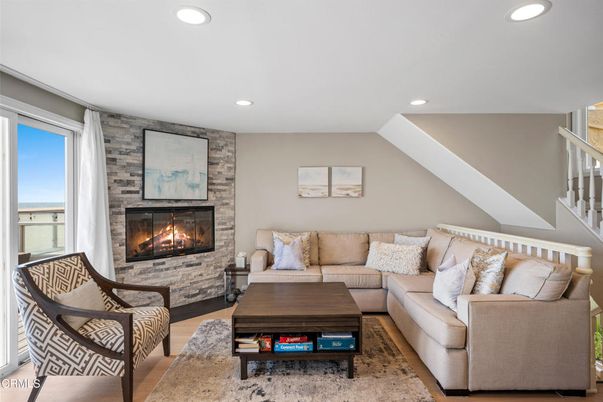Fireplace, Interior, Living room, Recessed Lighting, Stone Walls, Wood Texture Flooring