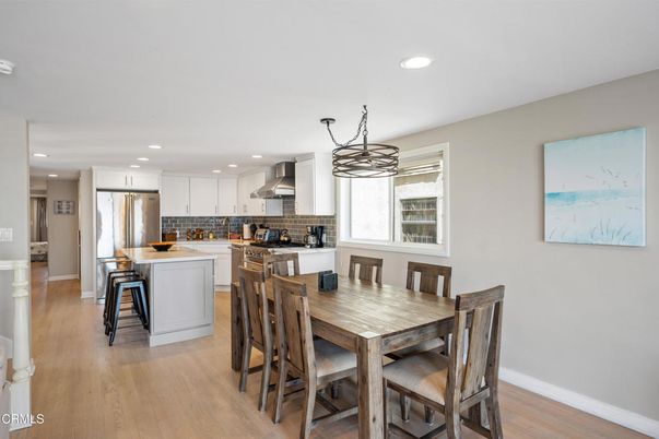 Dining room, Interior, Kitchen, Pendant Lights, Recessed Lighting, Stainless Steel Appliances, Wood Texture Flooring