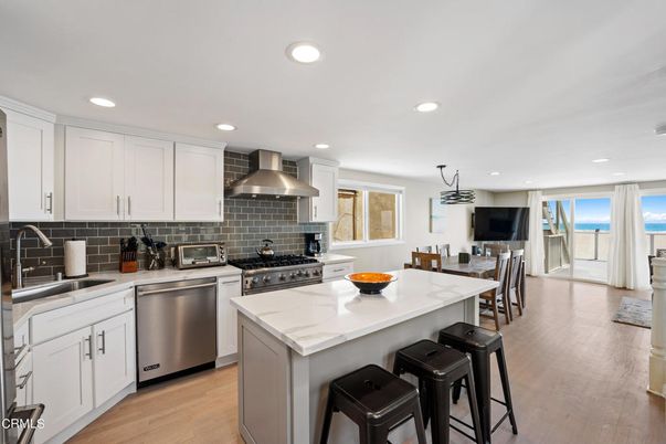 Dining room, Interior, Kitchen, Recessed Lighting, Stainless Steel Appliances, Wood Texture Flooring