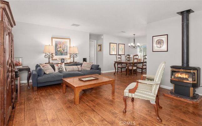 Chandelier, Dining room, Fireplace, Interior, Living room, Wood Texture Flooring
