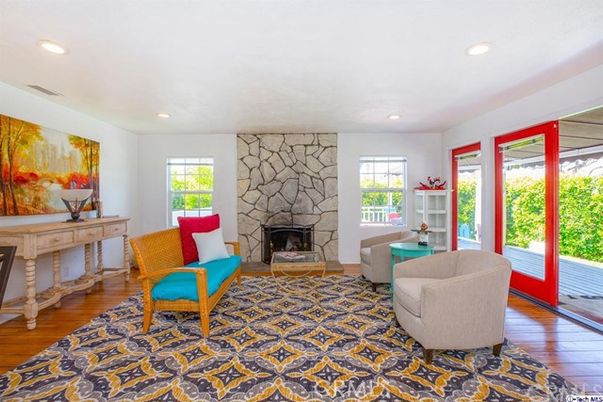 Fireplace, Interior, Living room, Recessed Lighting, Stone Walls, Wood Texture Flooring