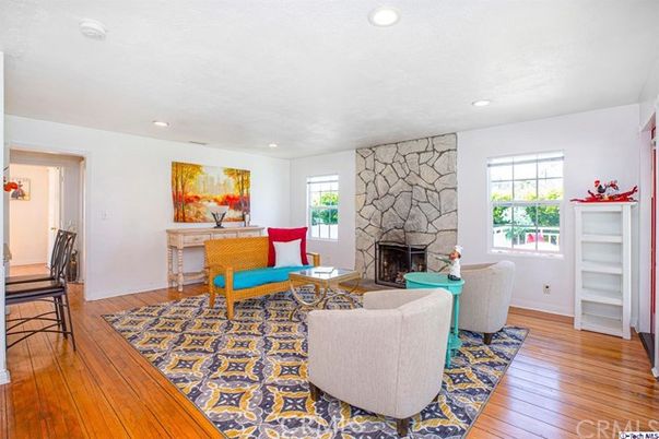 Fireplace, Interior, Living room, Recessed Lighting, Stone Walls, Wood Texture Flooring