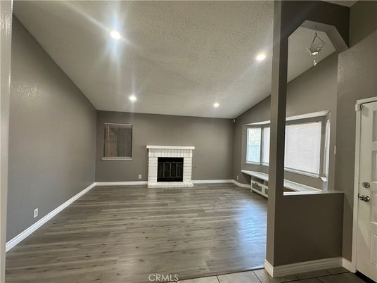 Empty room, Fireplace, Interior, Recessed Lighting, Wood Texture Flooring