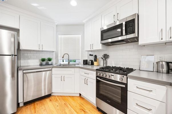 Interior, Kitchen, Recessed Lighting, Stainless Steel Appliances, Wood Texture Flooring