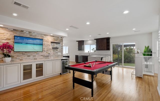 Billiard Table, Game Room, Interior, Recessed Lighting, Stone Walls, Wood Texture Flooring