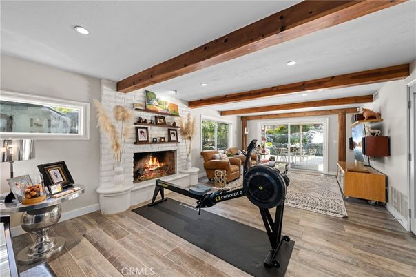 Fireplace, Fitness Equipment, Interior, Living room, Recessed Lighting, Wooden Beams, Wood Texture Flooring
