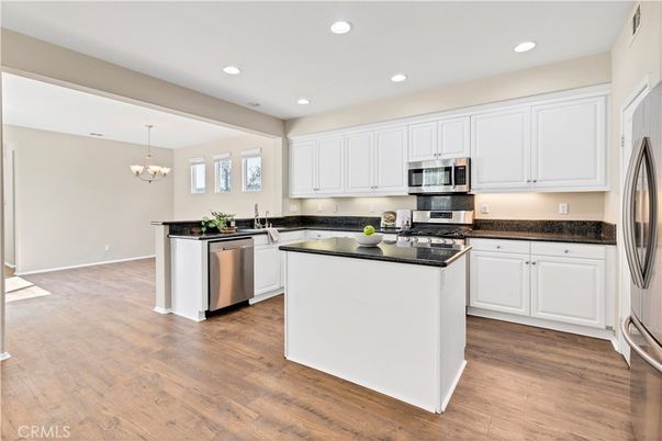 Chandelier, Interior, Kitchen, Recessed Lighting, Stainless Steel Appliances, Wood Texture Flooring