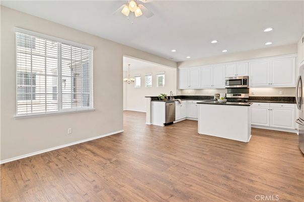 Chandelier, Interior, Kitchen, Recessed Lighting, Stainless Steel Appliances, Wood Texture Flooring