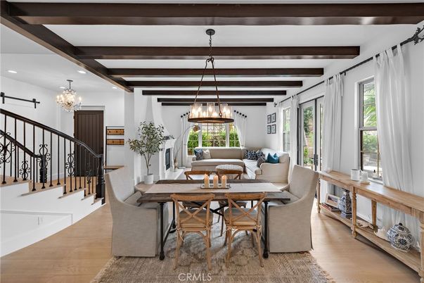 Chandelier, Dining room, Interior, Living room, Pendant Lights, Recessed Lighting, Wooden Beams, Wood Texture Flooring