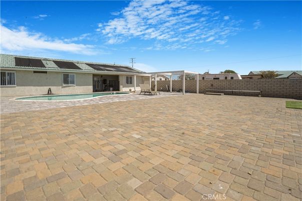 Exterior, Pool, Solar Panels