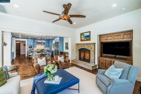 Fireplace, Interior, Kitchen, Living room, Pendant Lights, Recessed Lighting, Stainless Steel Appliances, Wood Texture Flooring