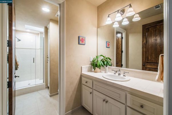 Bathroom, Glass Shower, Interior, Recessed Lighting, Tile Countertops