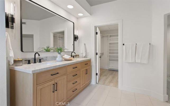 Bathroom, Dual Sink Vanities, Interior, Recessed Lighting, Walk-in Closets, Wood Texture Flooring