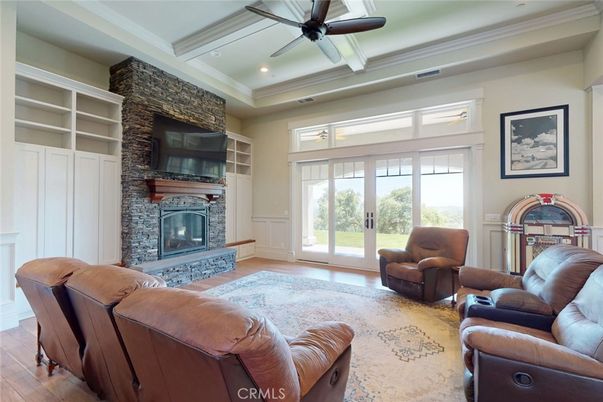 Fireplace, Interior, Living room, Recessed Lighting, Stone Walls, Wood Texture Flooring