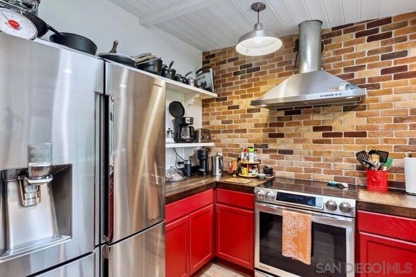 Interior, Kitchen, Pendant Lights, Stainless Steel Appliances, Stone Walls