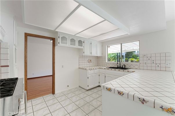 Interior, Kitchen, Tile Countertops, Wood Texture Flooring