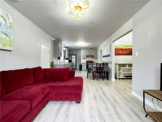 Dining room, Interior, Kitchen, Living room, Recessed Lighting, Stainless Steel Appliances, Wood Texture Flooring