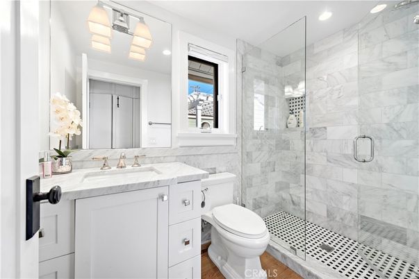 Bathroom, Glass Shower, Interior, Marble Walls, Recessed Lighting, Wood Texture Flooring