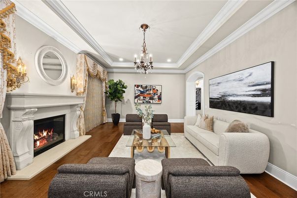 Chandelier, Fireplace, Interior, Living room, Recessed Lighting, Wood Texture Flooring