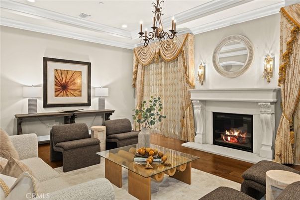 Chandelier, Fireplace, Interior, Living room, Recessed Lighting, Wood Texture Flooring