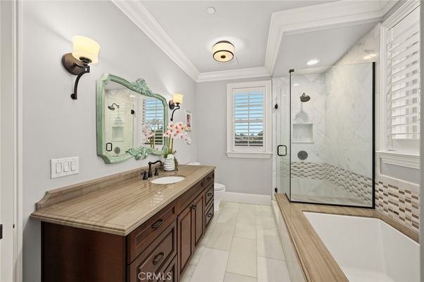 Bathroom, Dual Sink Vanities, Glass Shower, Interior, Marble Walls, Recessed Lighting