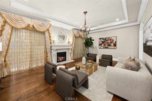 Chandelier, Fireplace, Interior, Living room, Recessed Lighting, Wood Texture Flooring