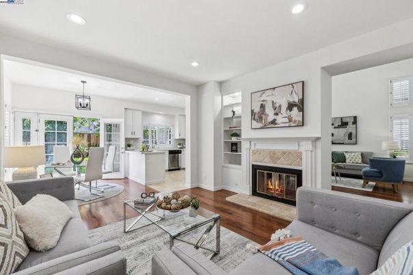 Dining room, Fireplace, Interior, Living room, Pendant Lights, Recessed Lighting, Wood Texture Flooring