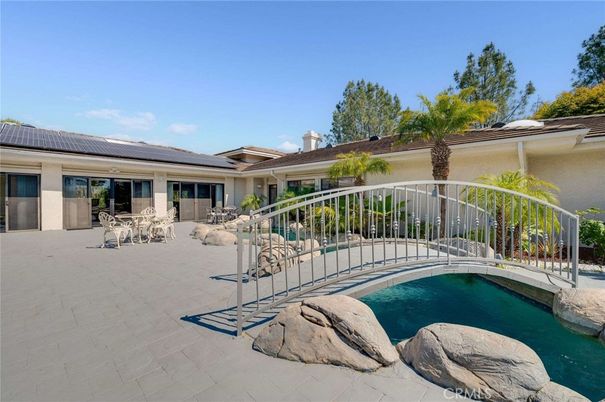 Exterior, Pool, Solar Panels