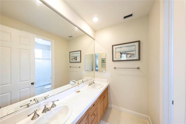 Bathroom, Dual Sink Vanities, Interior, Recessed Lighting, Tile Countertops